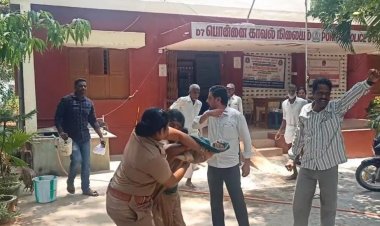 பெண் போலிசால் சாமர்த்தியமாக தவிர்க்கப்பட்ட தீக்குளிப்பு சம்பவம்!