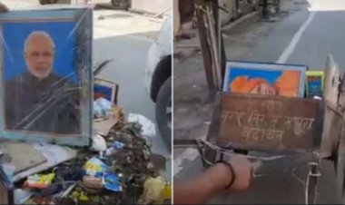 பிரதமரின் புகைப்படம் குப்பை வண்டியில்: பணிநீக்கம்-மீண்டும் சேர்ப்பு!