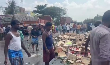 லாரி கவிழ்ந்து மது பாட்டில்கள் சிதறல்! மது பிரியர்களை விரட்டி அடித்த போலீசார்!