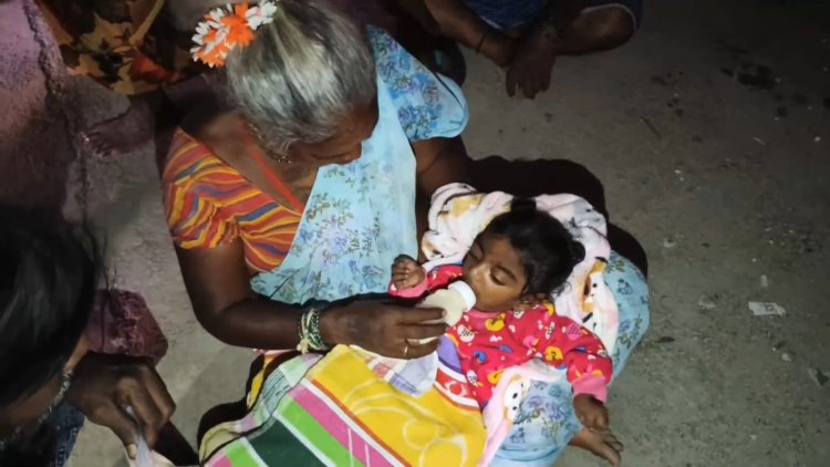 குழந்தையை கைமாற்றி விட்டு ஓடிய பெண்!